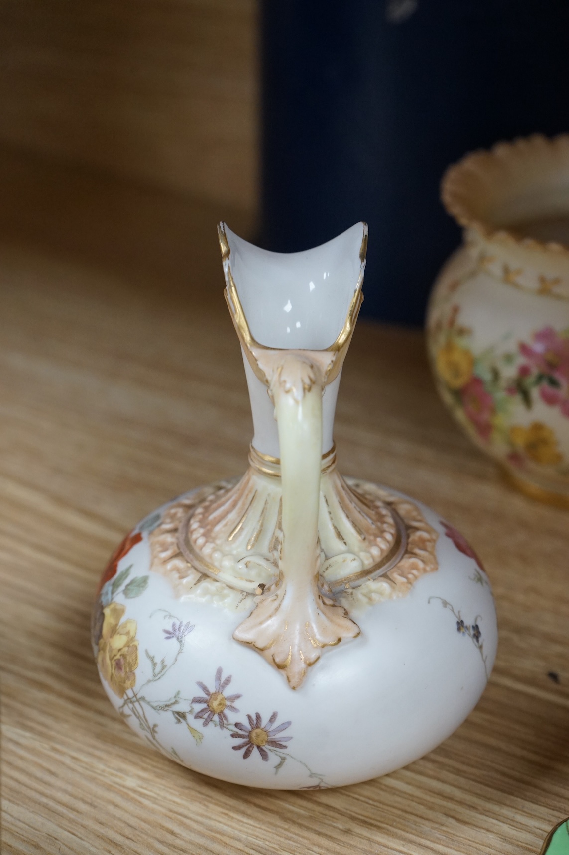 A Worcester butterfly handled cup and saucer and four other items, together with Royal Crown Derby, Dresden and Coalport items. (9). Tallest 13 cm